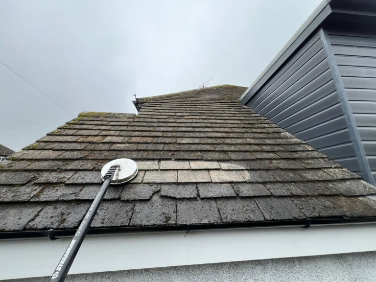 Close-up of a roof cleaning process